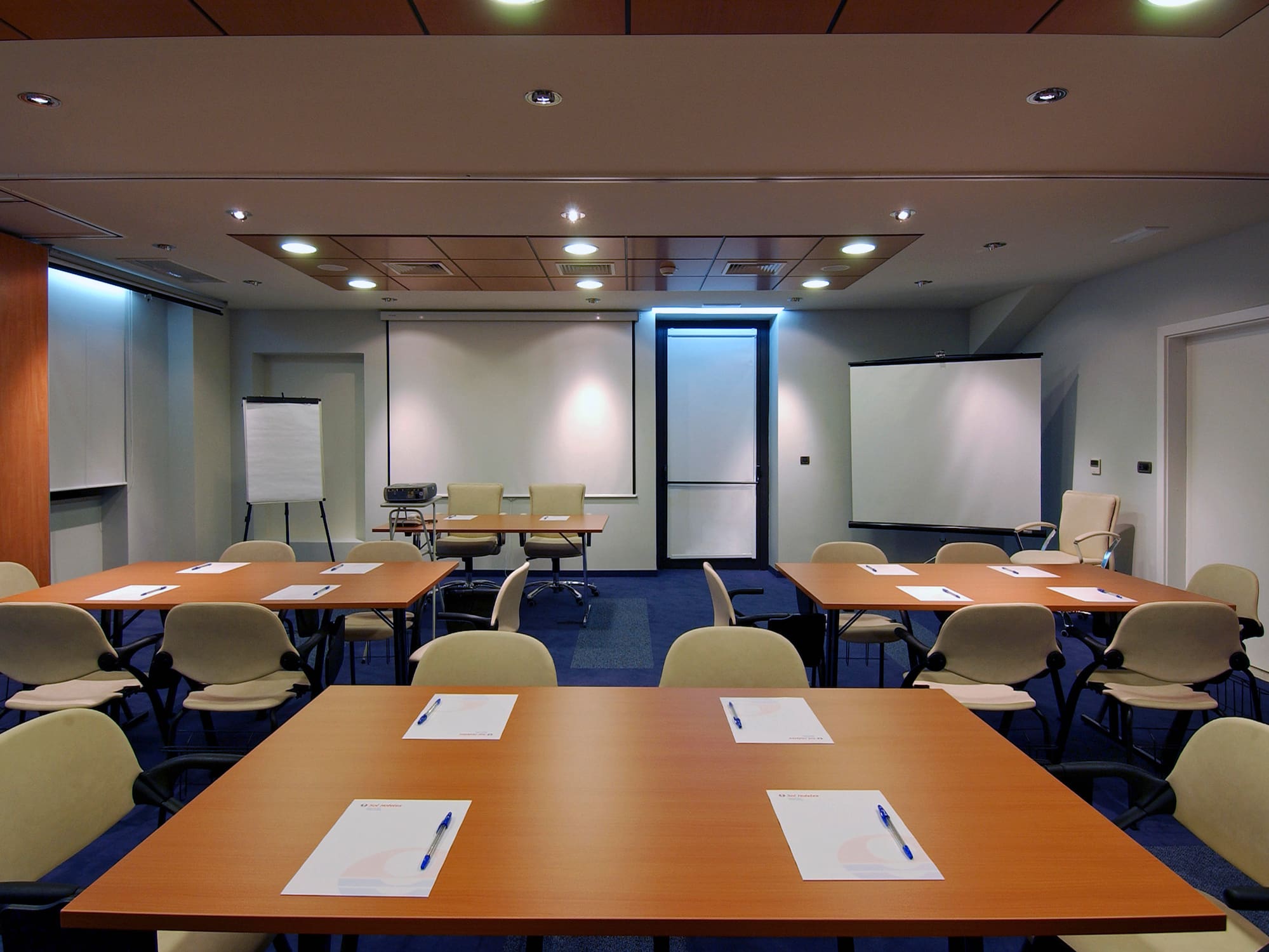 a room with tables and chairs