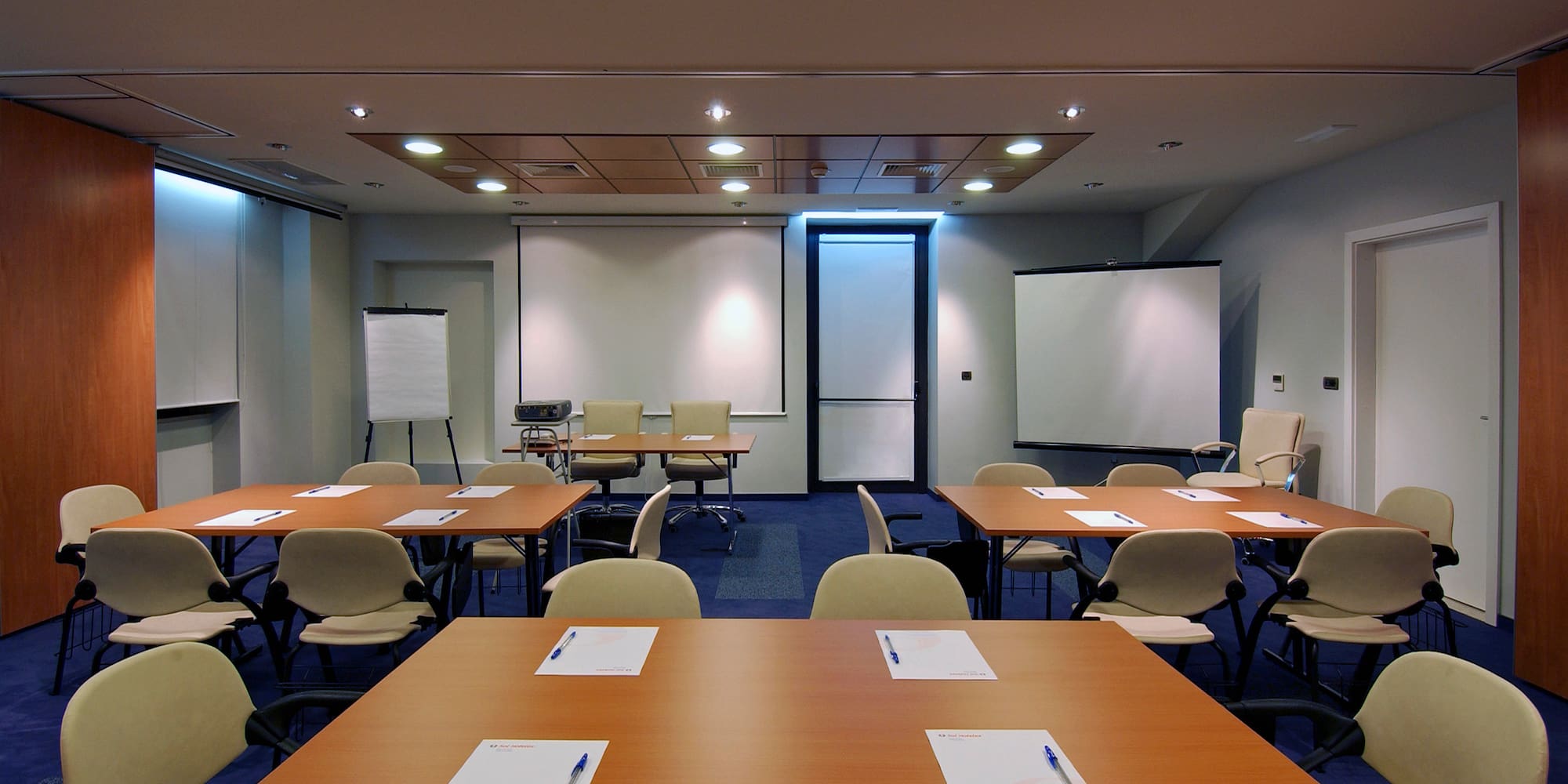 a room with tables and chairs