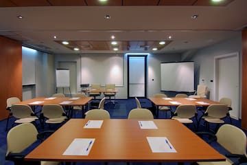 a room with tables and chairs