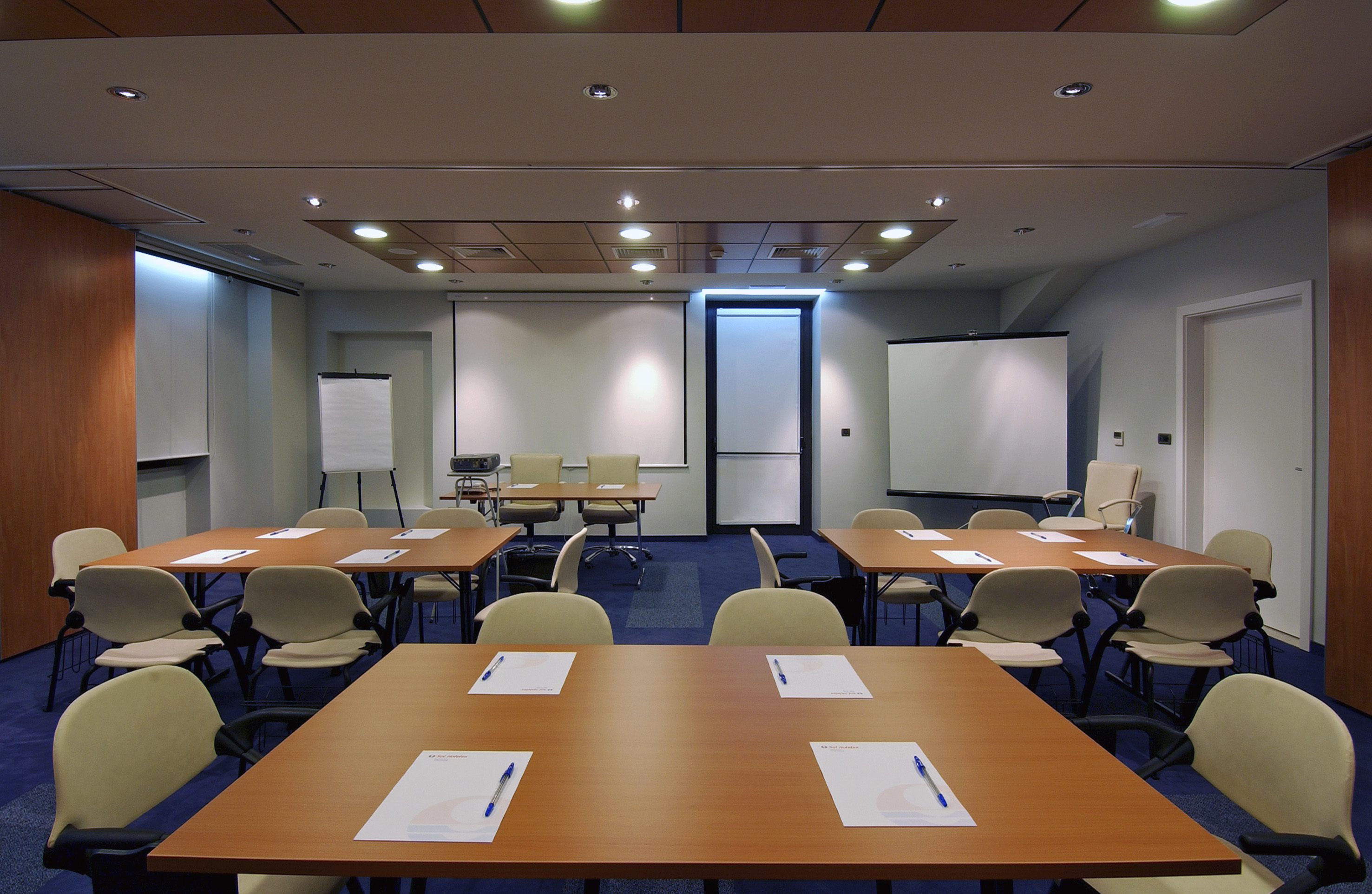 a room with tables and chairs