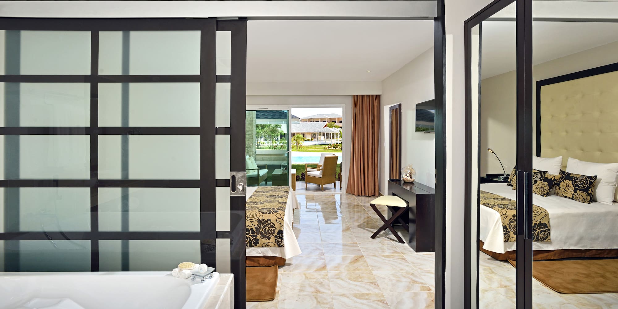 a bathroom with a bathtub and a bathtub