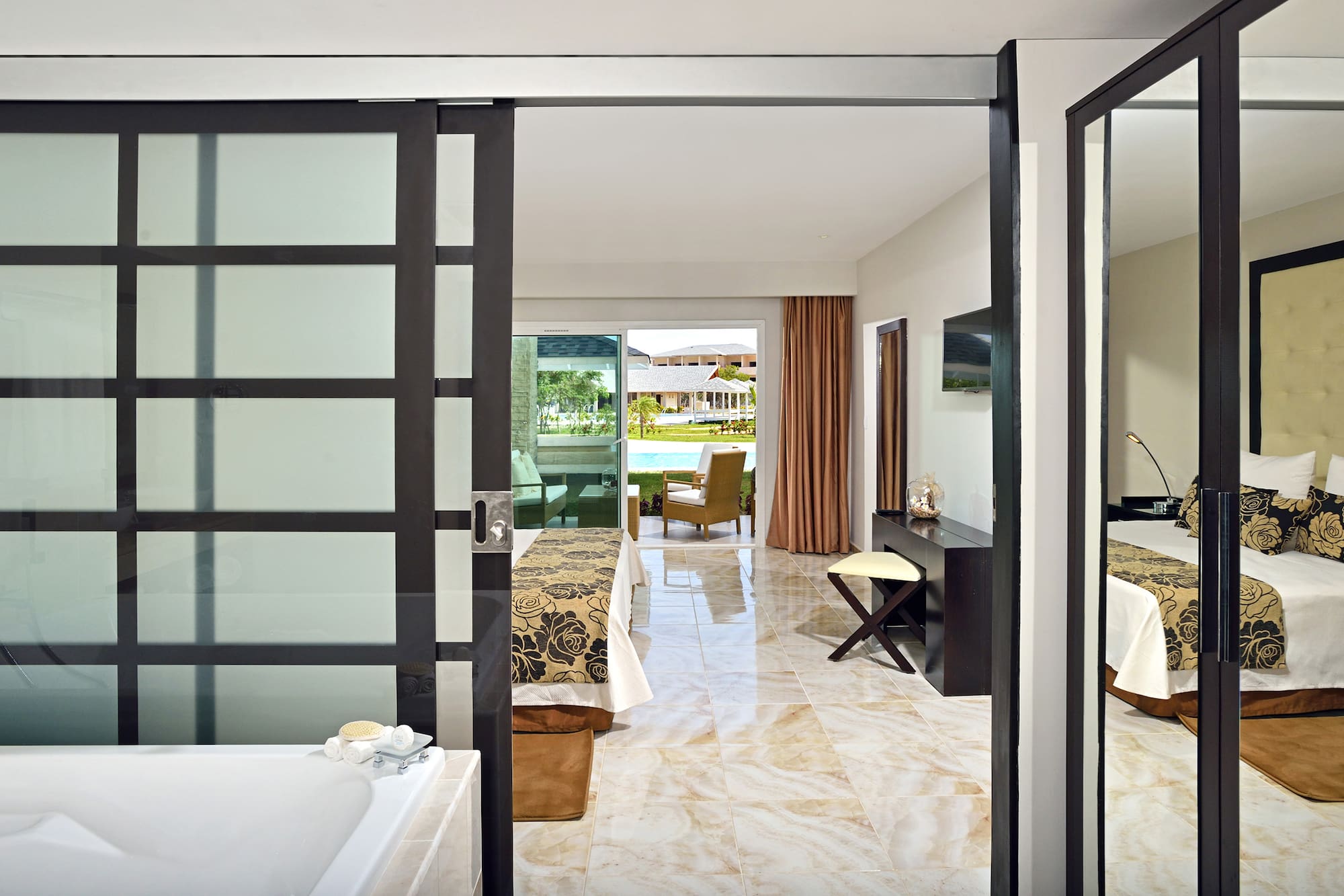 a bathroom with a bathtub and a bathtub