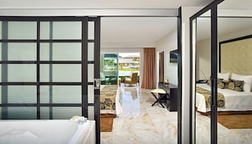 a bathroom with a bathtub and a bathtub