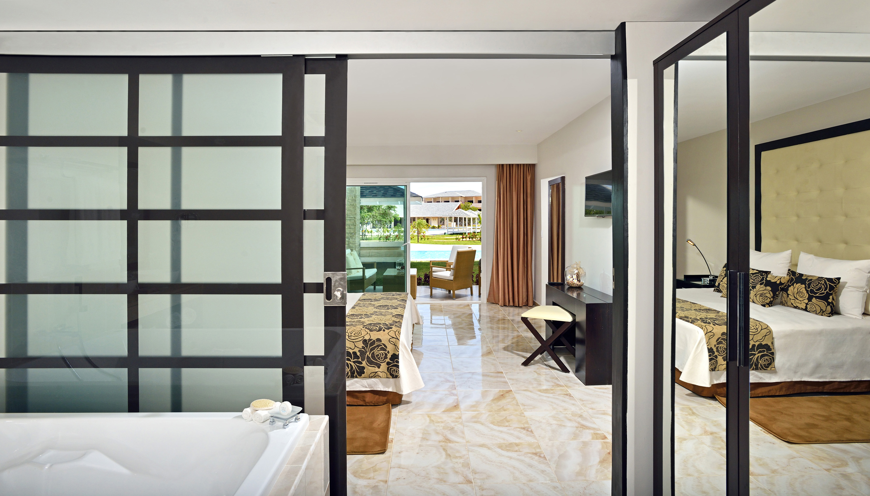 a bathroom with a bathtub and a bathtub