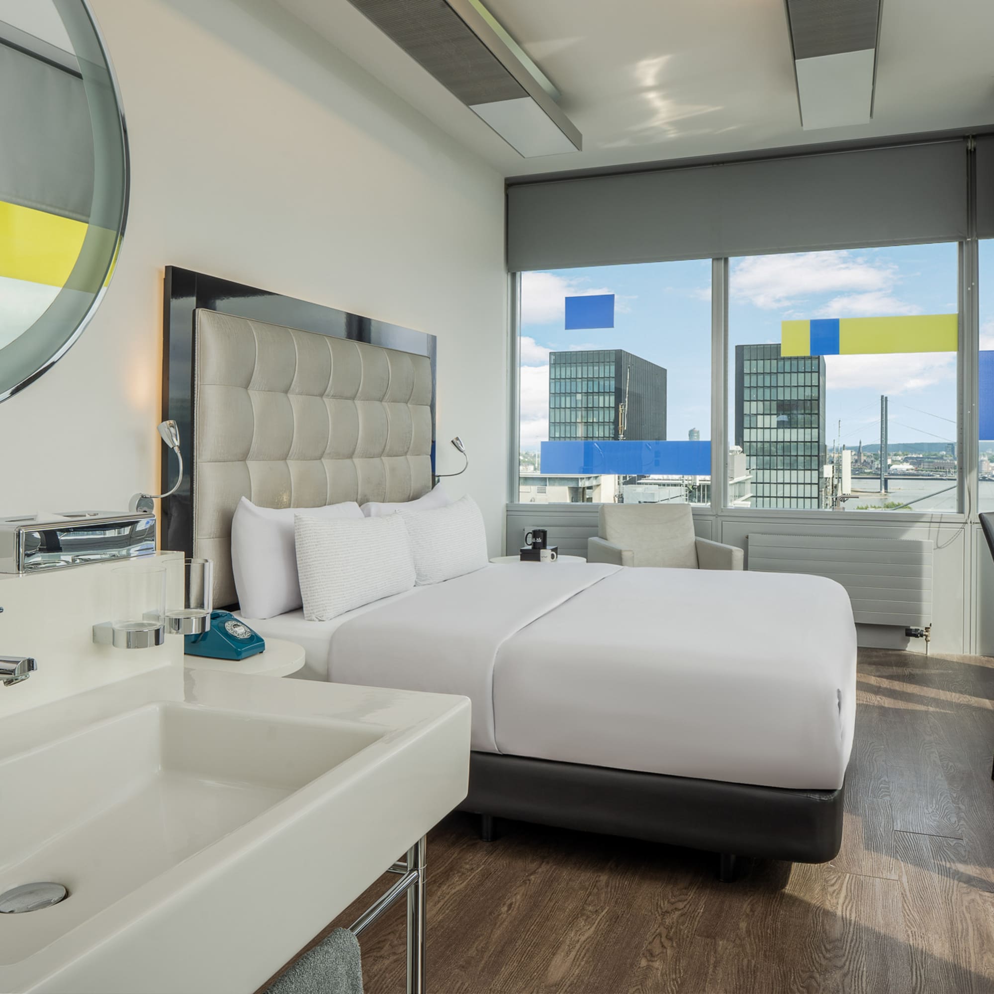 a room with a bed and sink