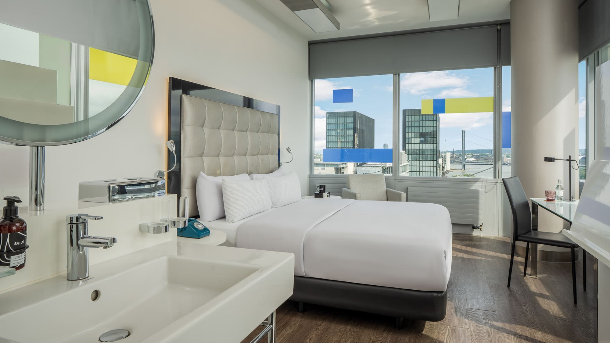 a room with a bed and sink