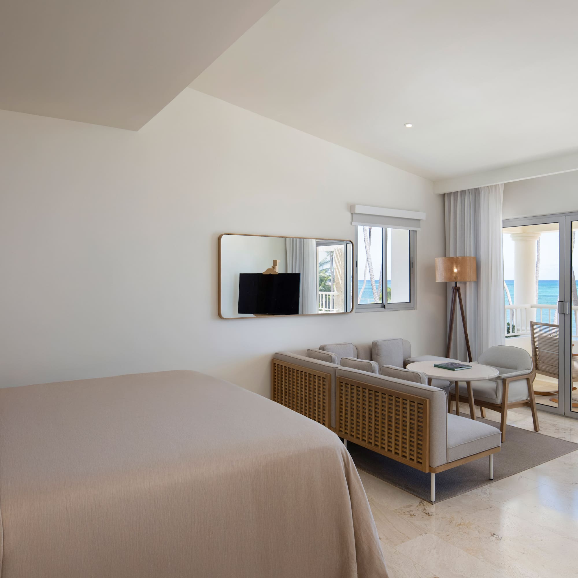 a room with a bed and a television