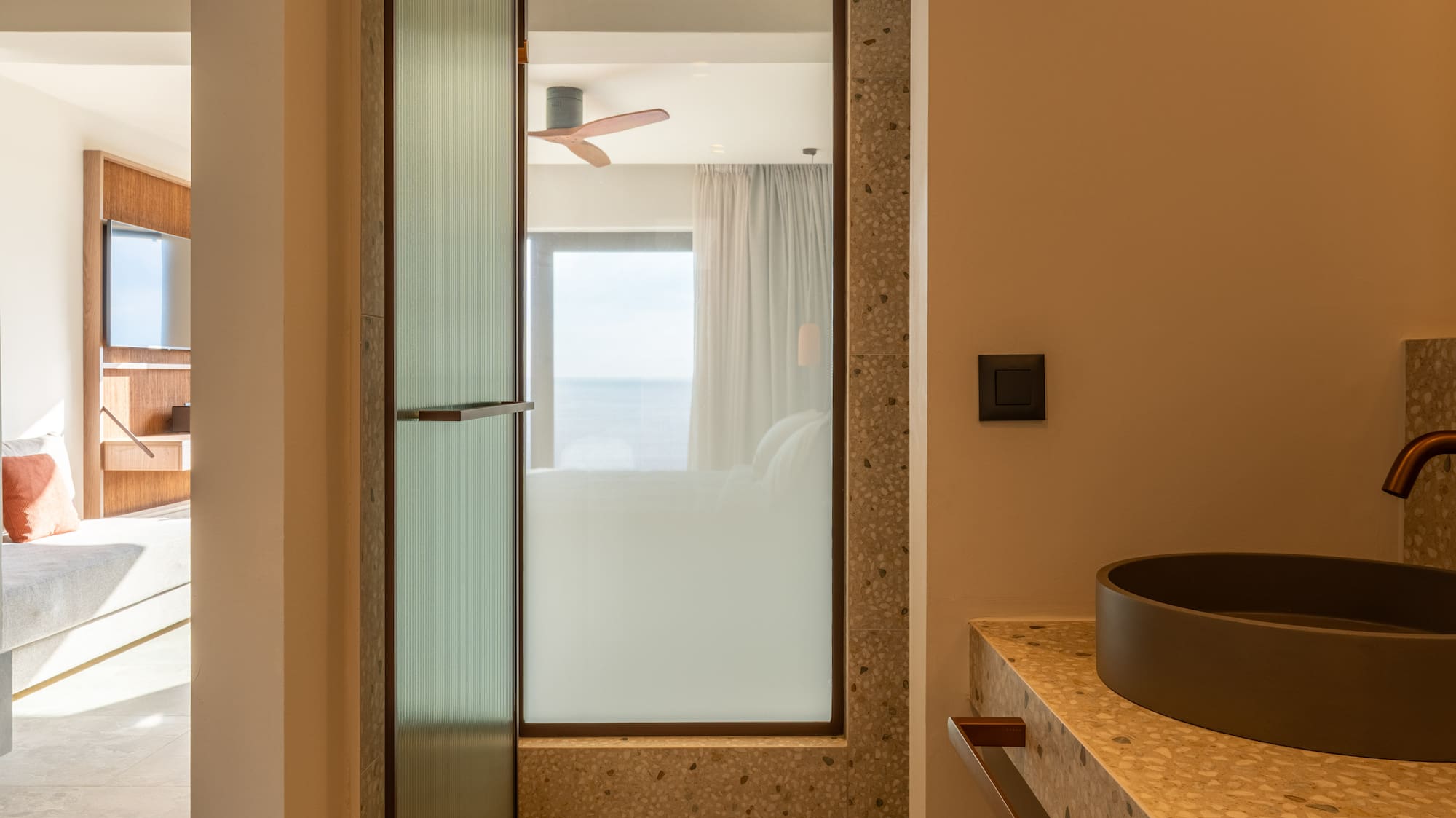 a bathroom with a sink and a shower