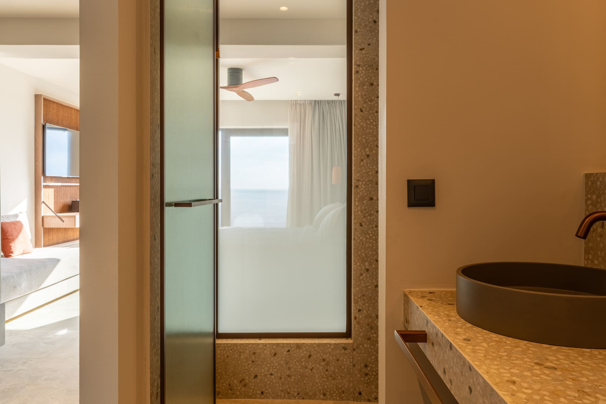 a bathroom with a sink and a shower