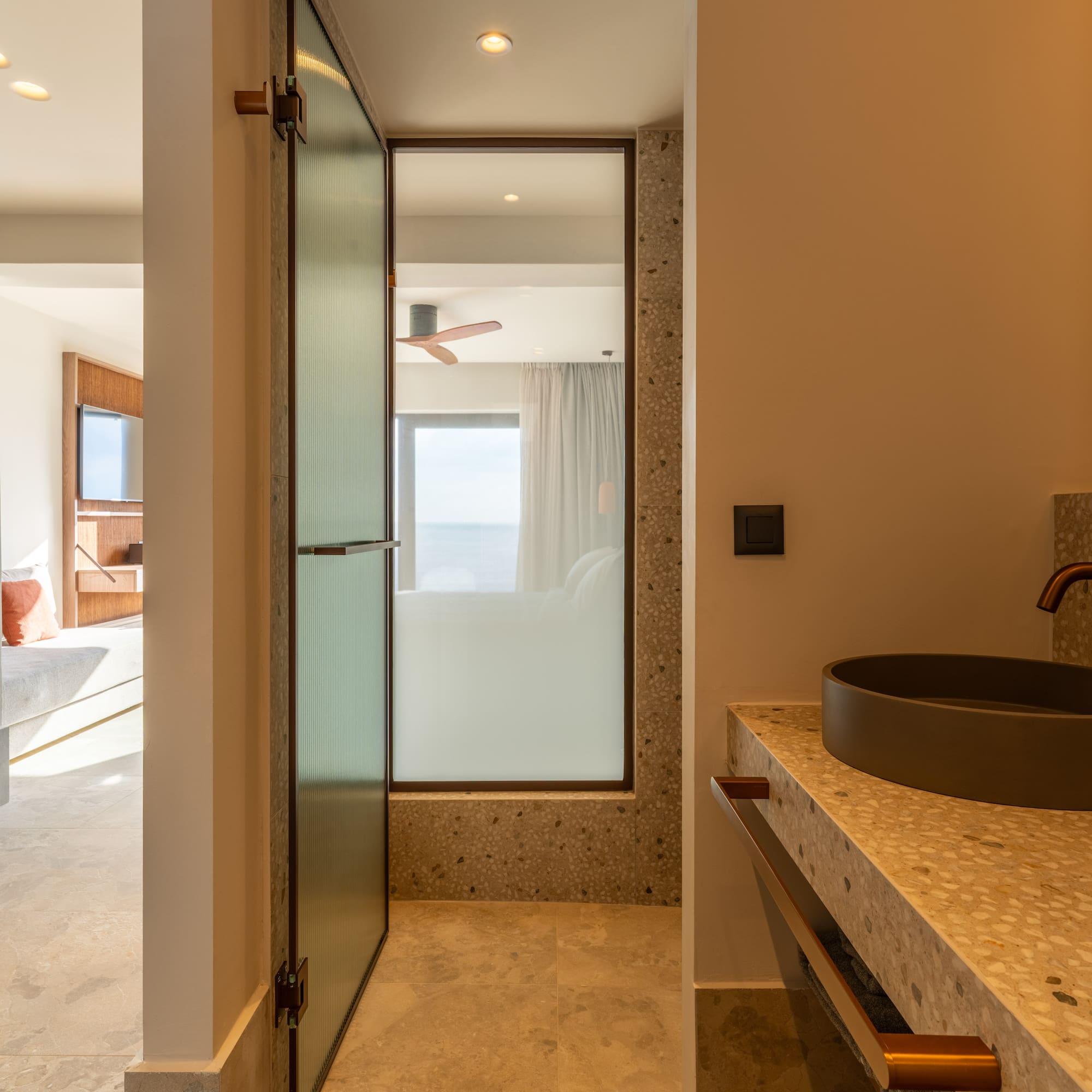 a bathroom with a sink and a shower