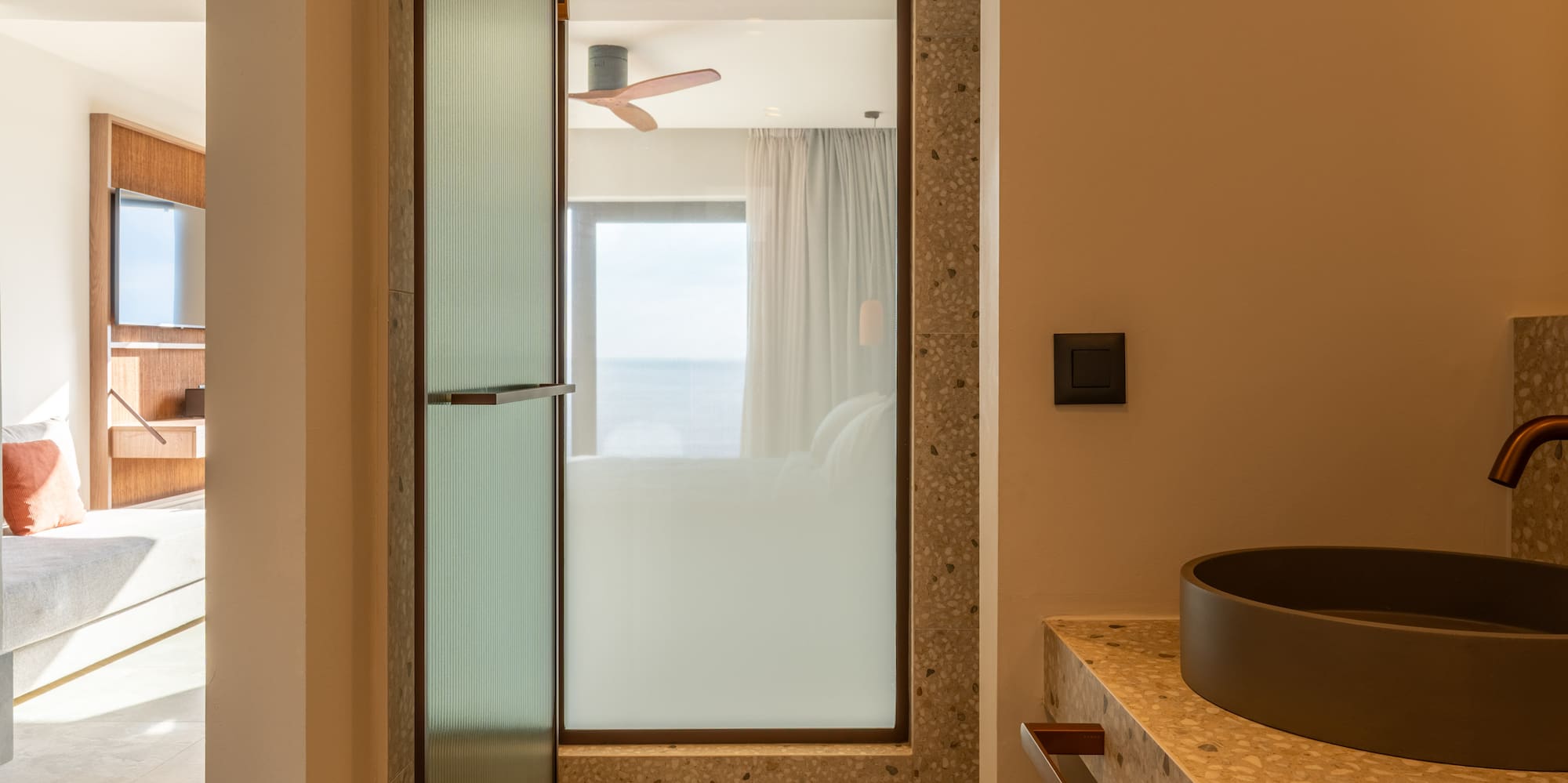 a bathroom with a sink and a shower