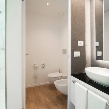 a bathroom with a sink and toilet