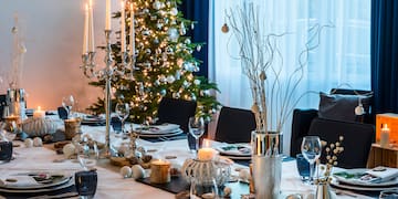 a table set for a holiday dinner