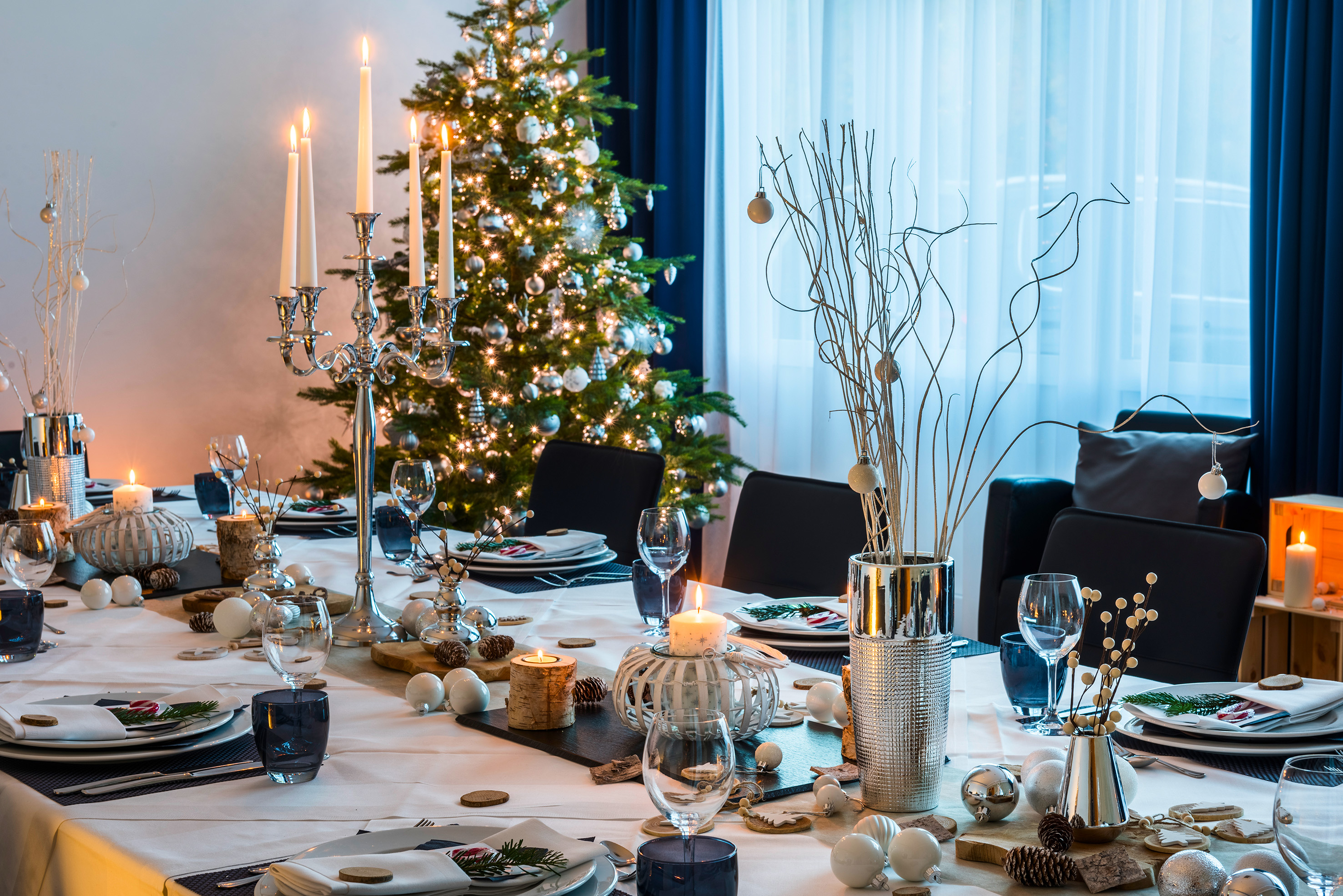 a table set for a holiday dinner