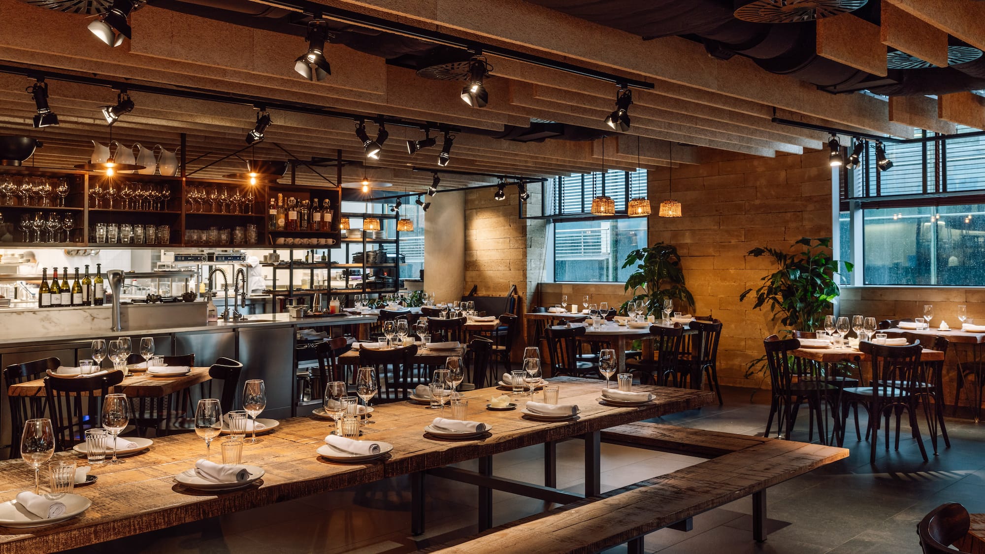 a restaurant with tables and benches