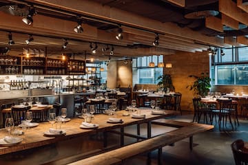 a restaurant with tables and benches