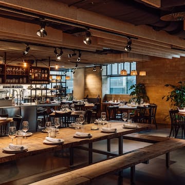 a restaurant with tables and benches