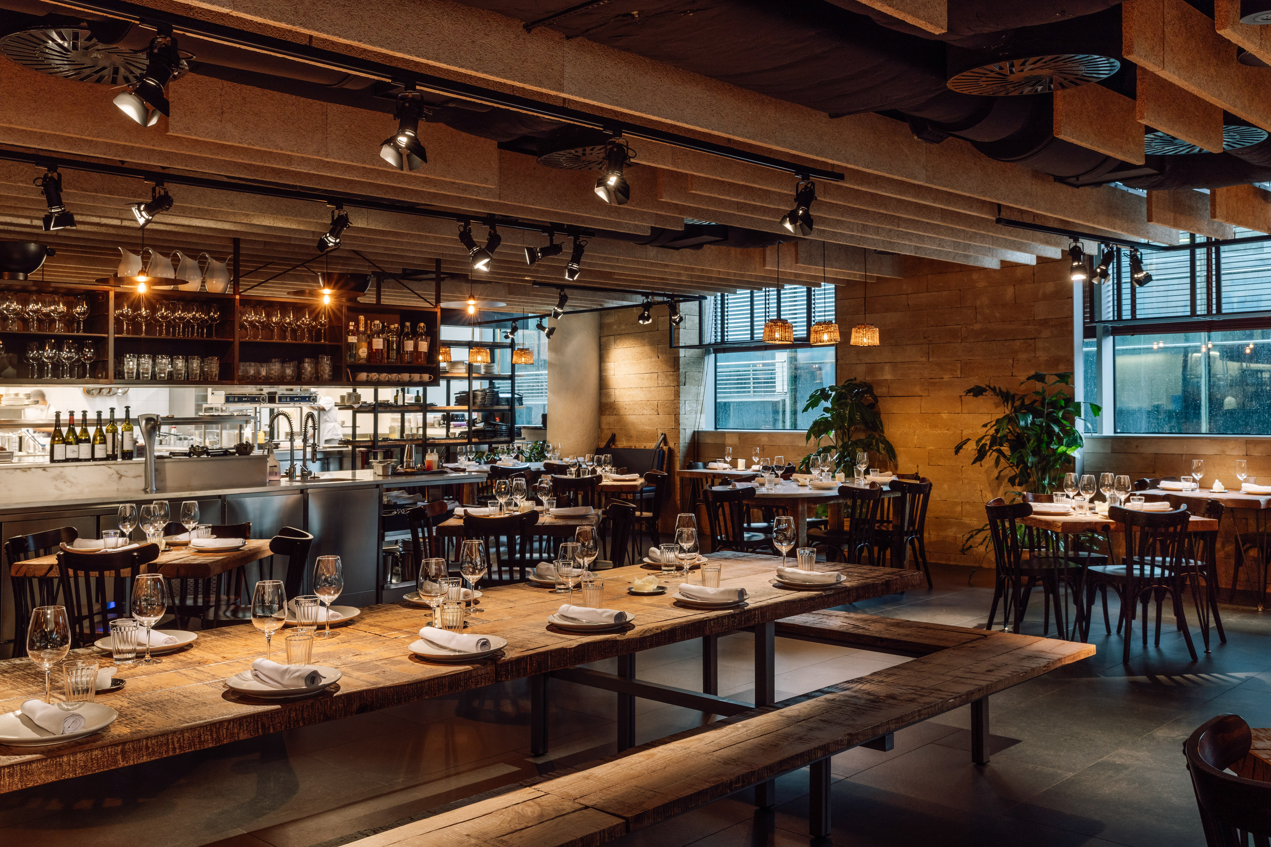 a restaurant with tables and benches