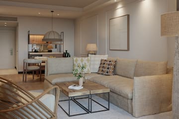 a living room with a couch and a table