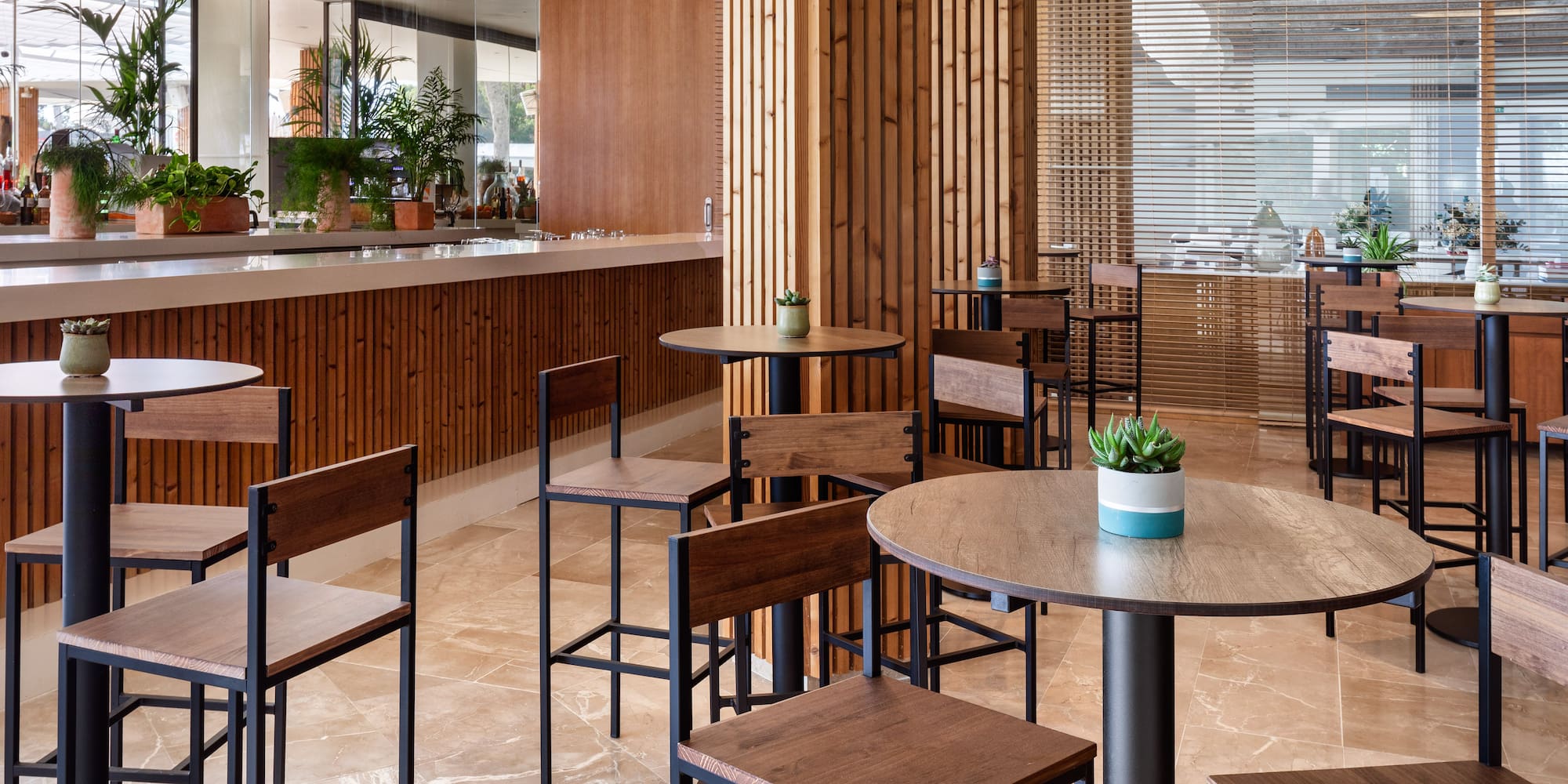 a room with tables and chairs