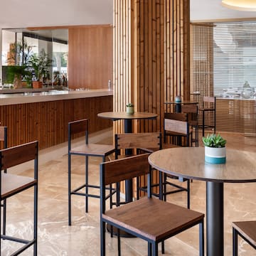 a room with tables and chairs