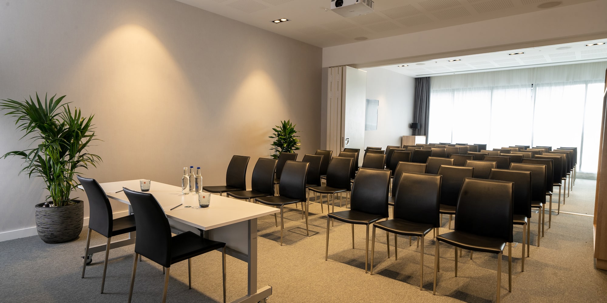 a room with chairs and tables