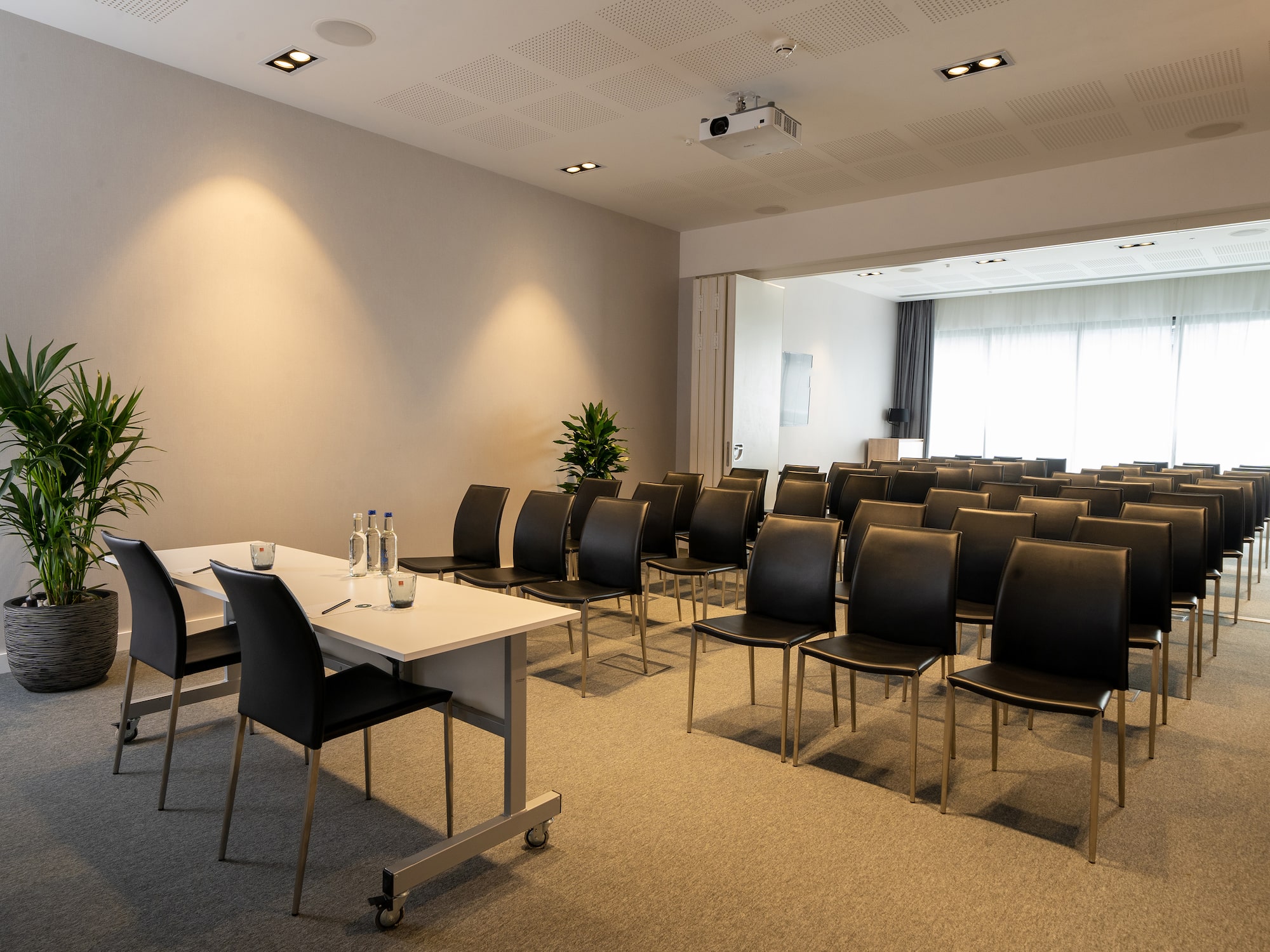 a room with chairs and tables