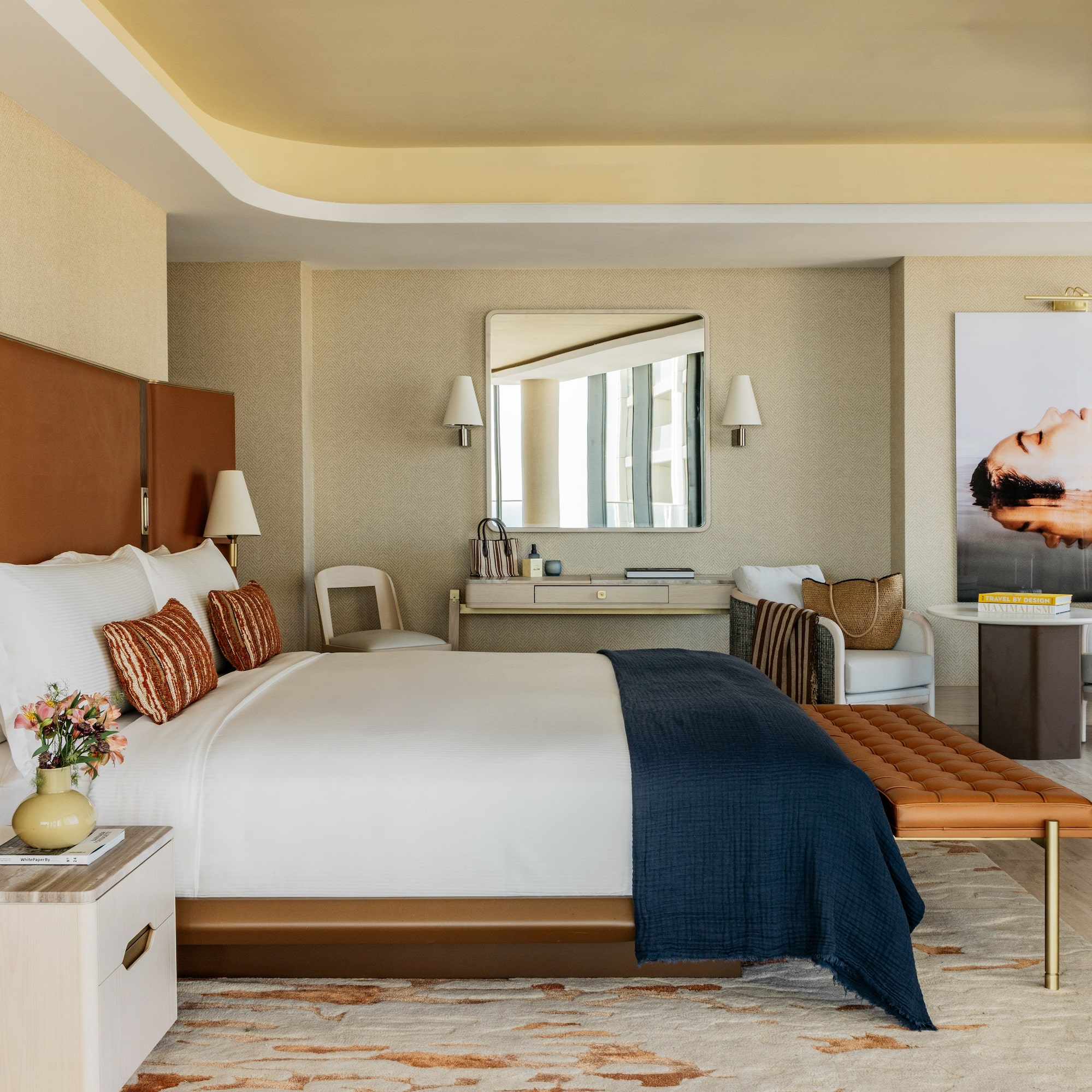 a bedroom with a bed and a chair