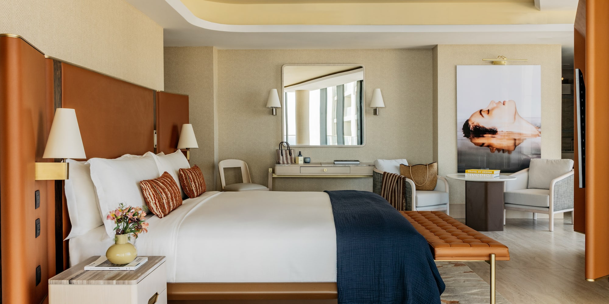 a bedroom with a bed and a chair