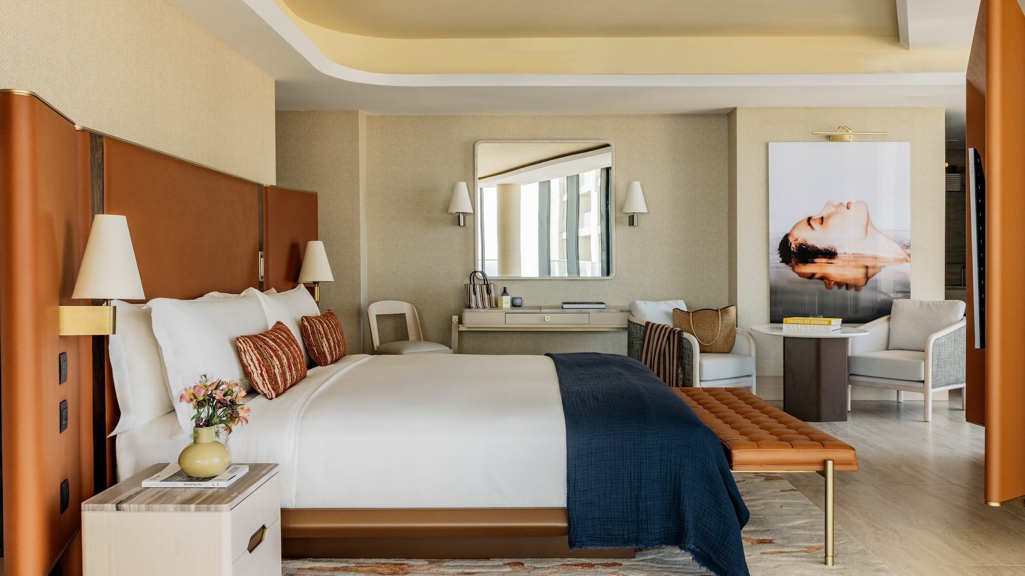 a bedroom with a bed and a chair