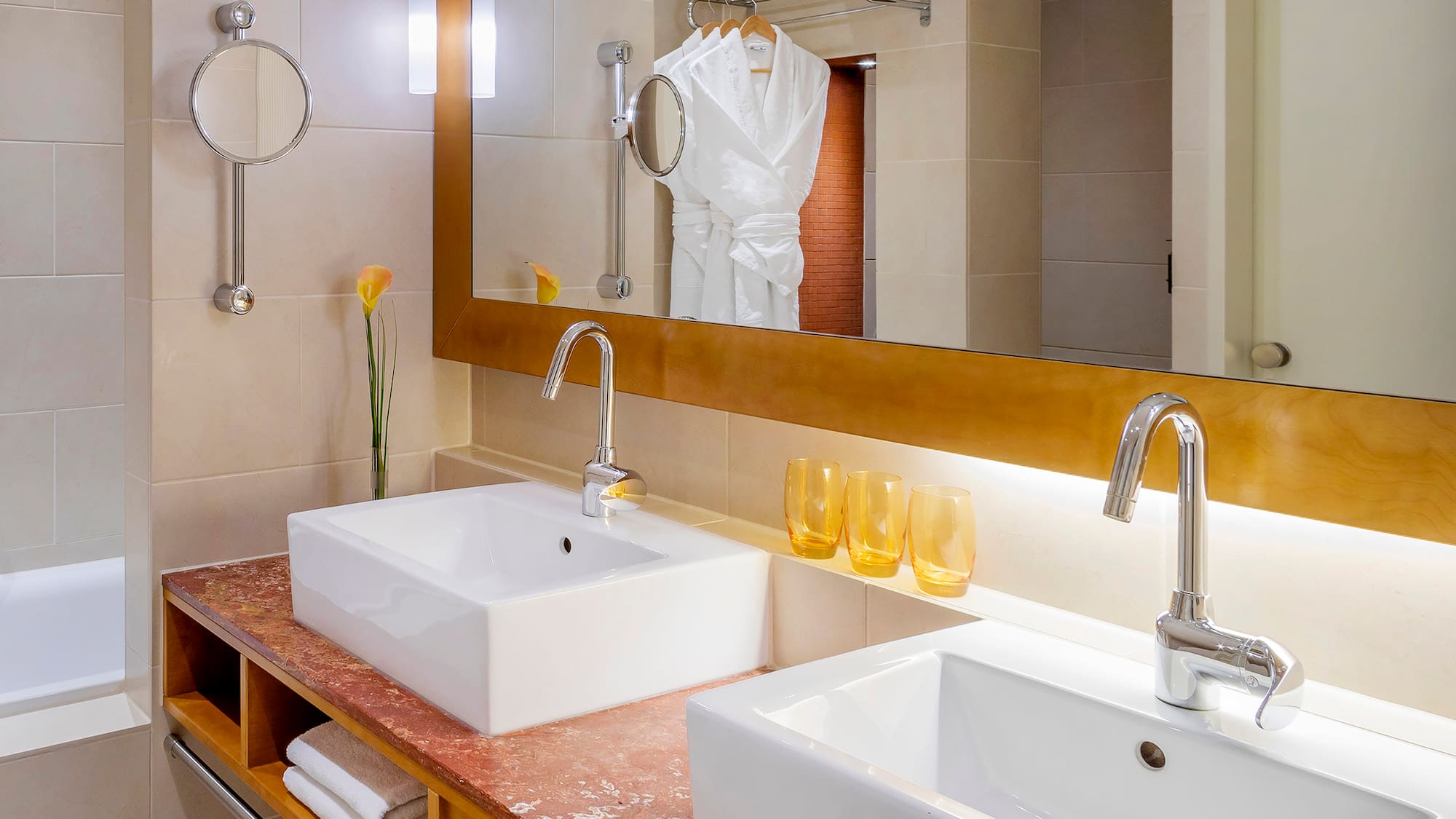 a bathroom with a mirror and sink