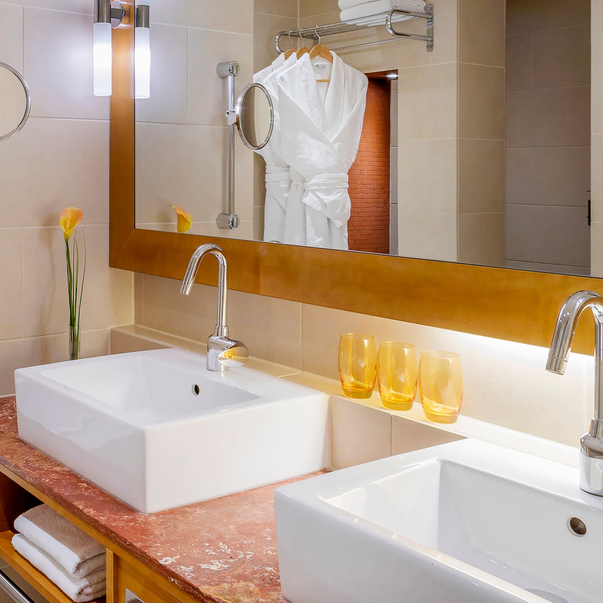 a bathroom with a mirror and sink