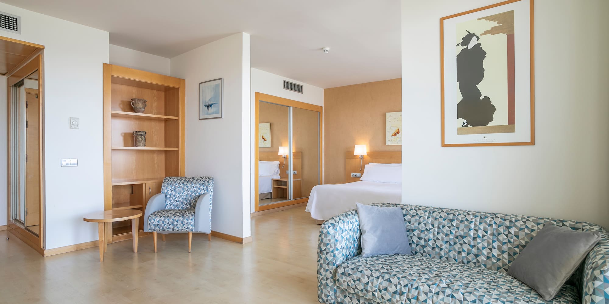 a room with a couch and a bed