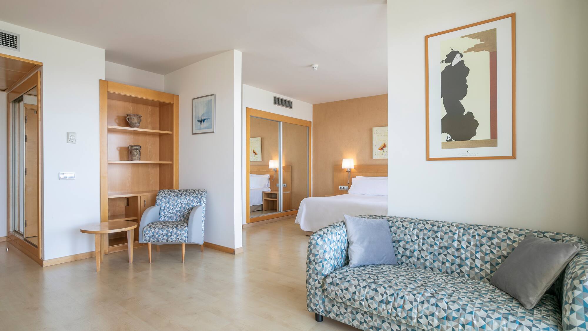 a room with a couch and a bed