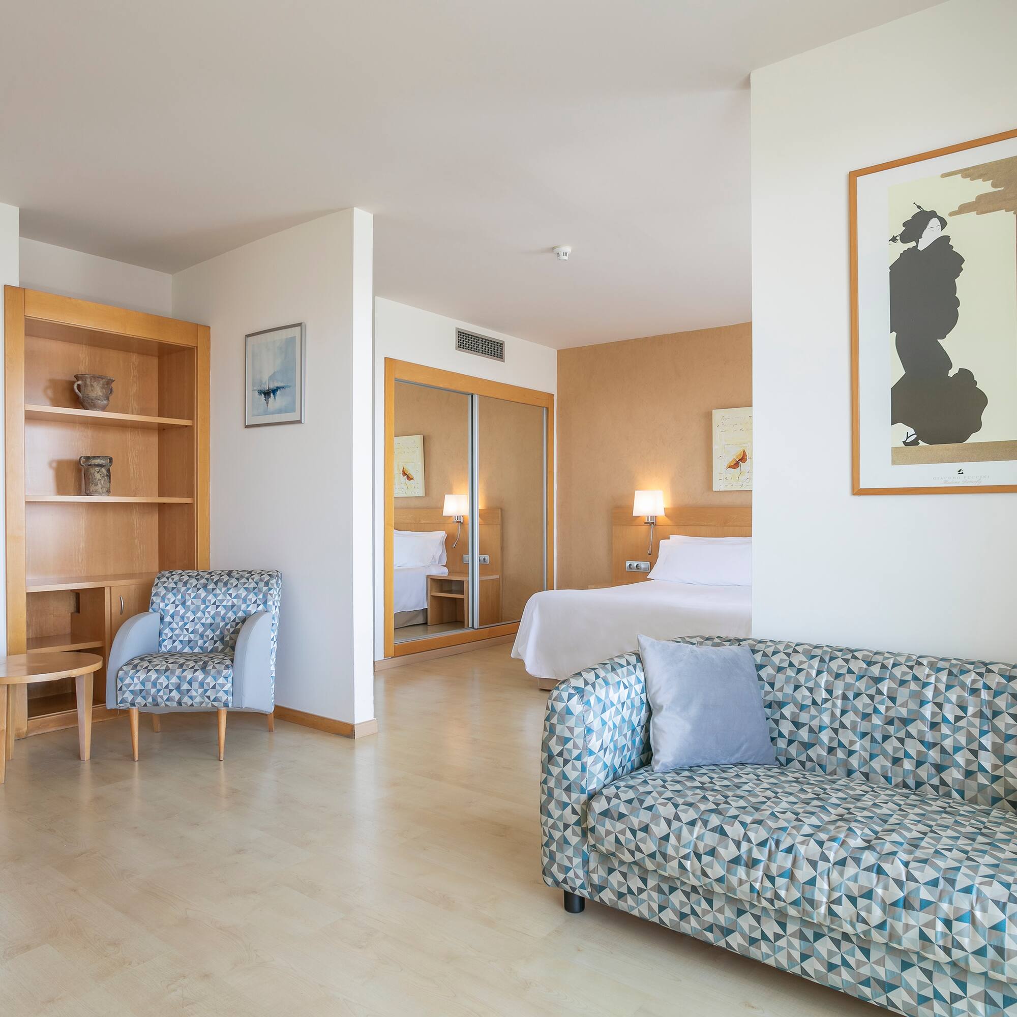 a room with a couch and a bed