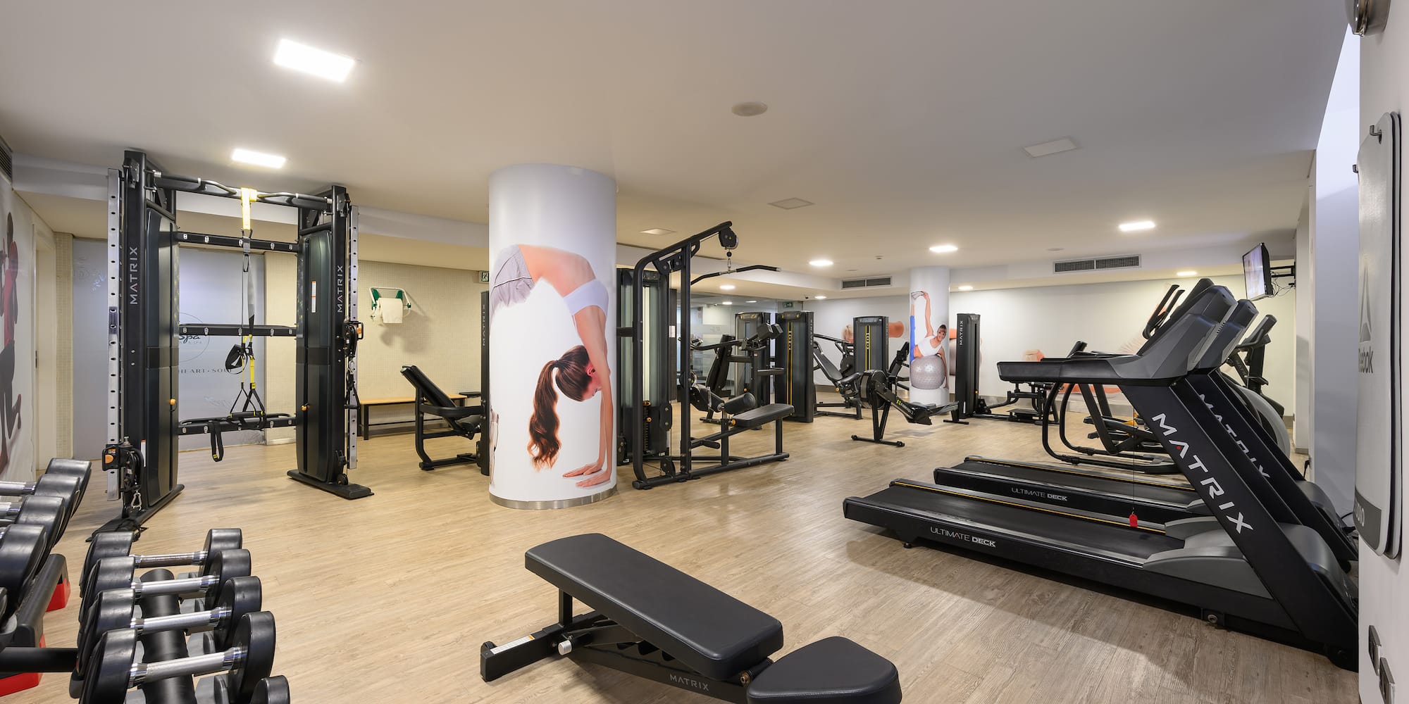 a large gym with exercise equipment