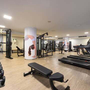 a large gym with exercise equipment