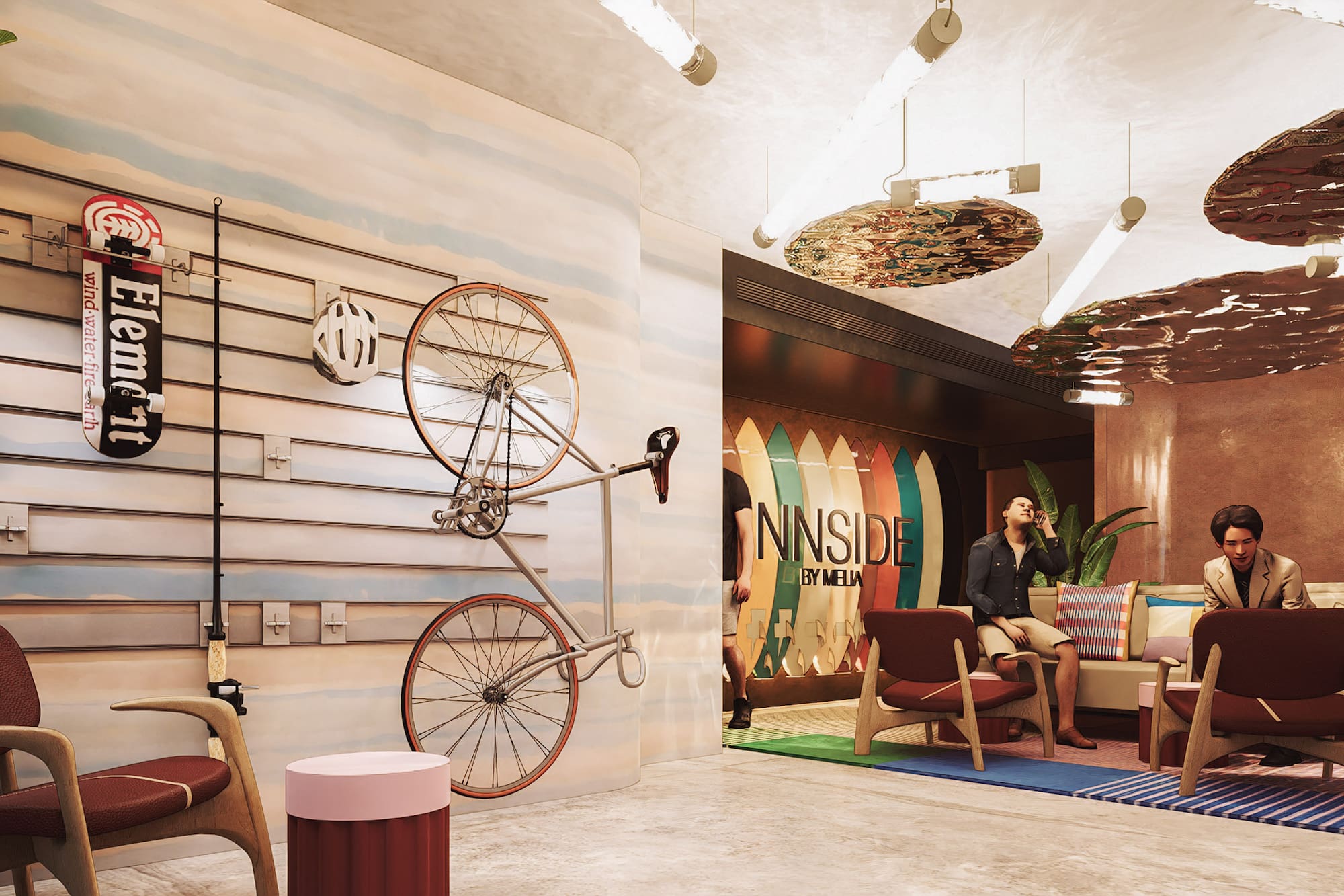 a man sitting on a couch with a bicycle on the wall