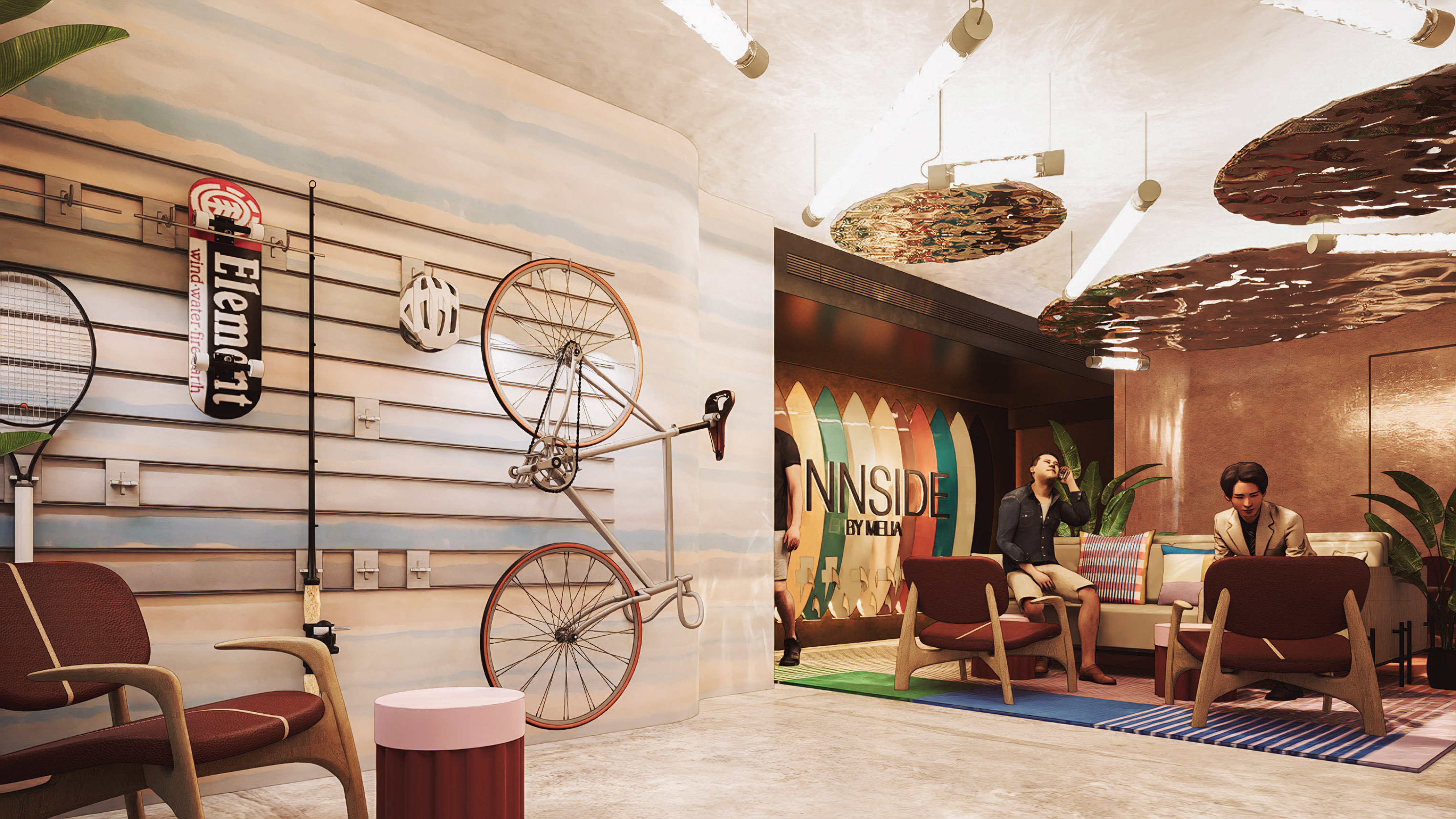 a man sitting on a couch with a bicycle on the wall