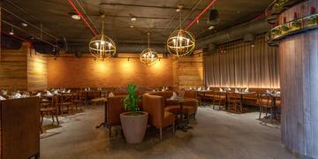 a room with tables and chairs