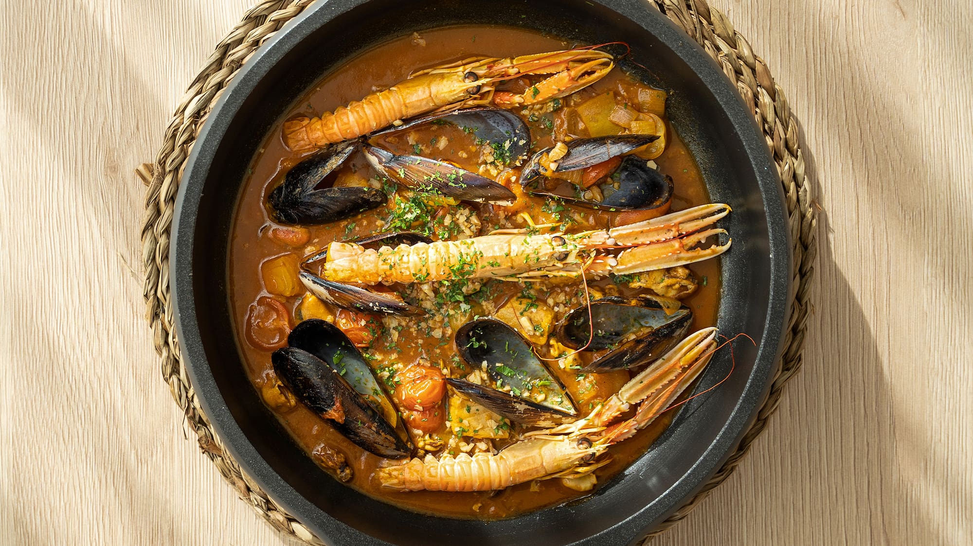 a pan of seafood soup