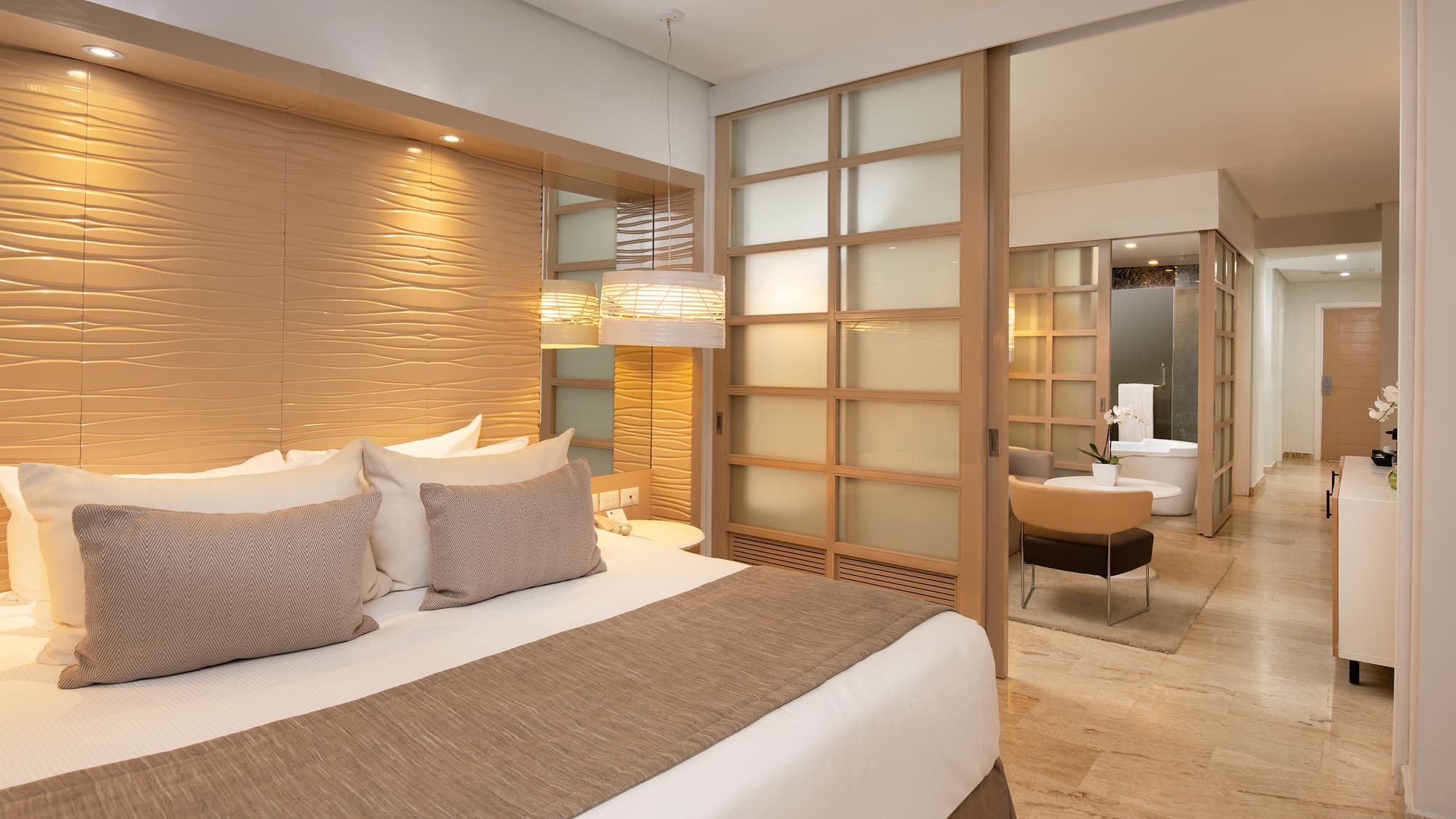 a bedroom with a bed and a bathtub