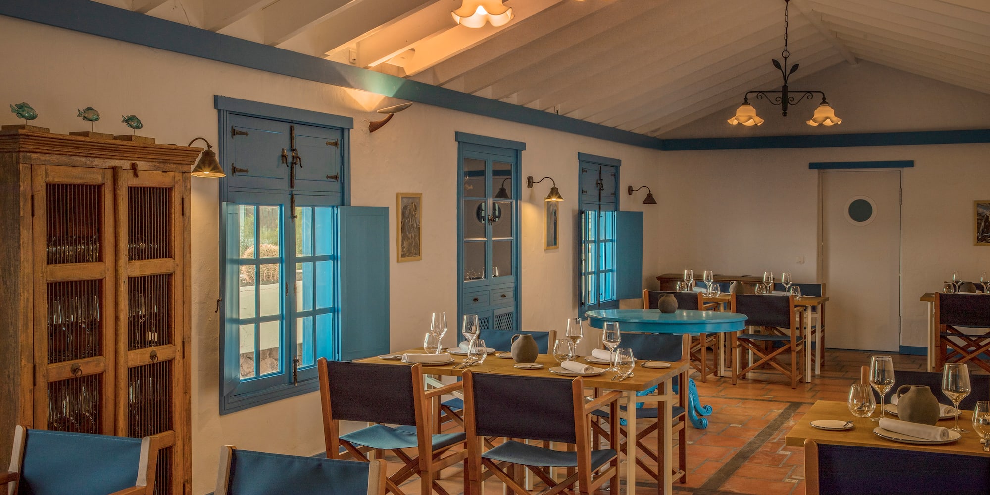 a room with tables and chairs