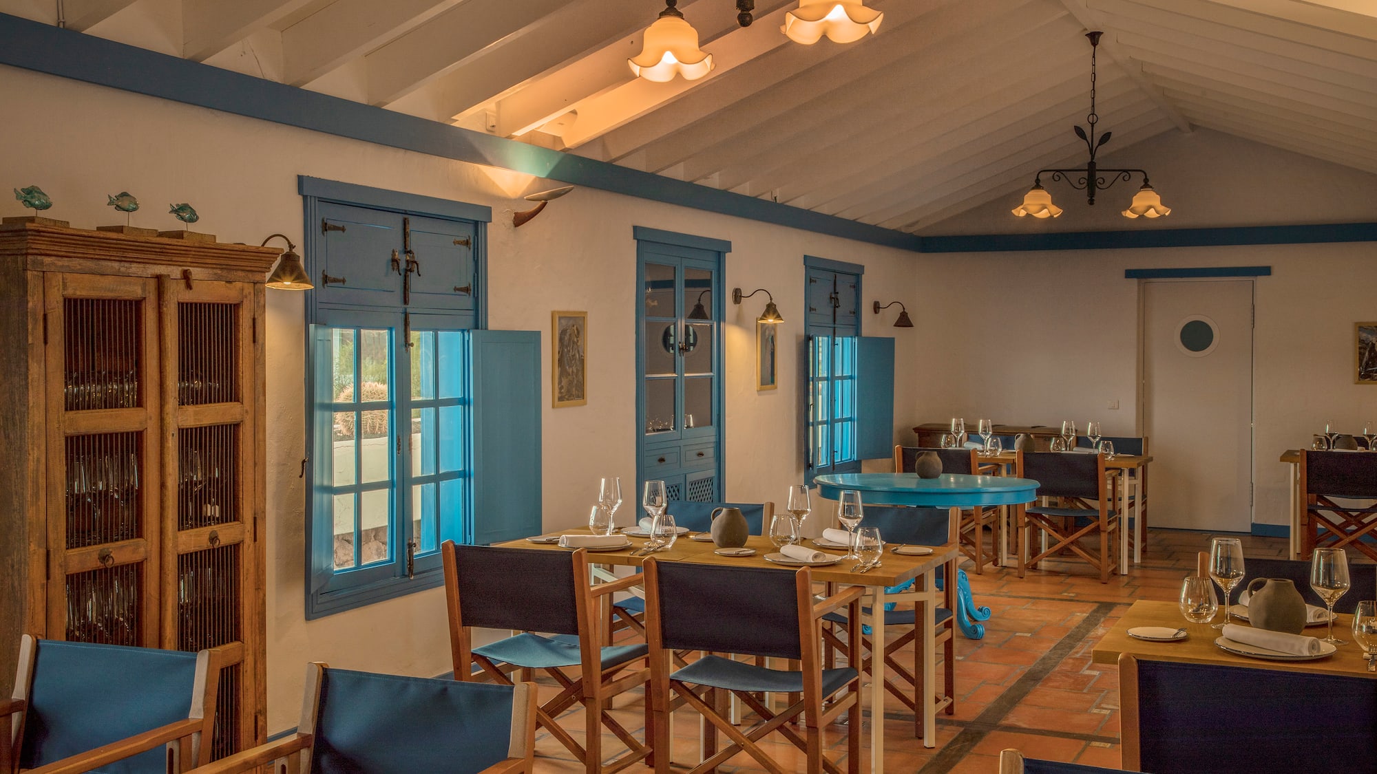 a room with tables and chairs