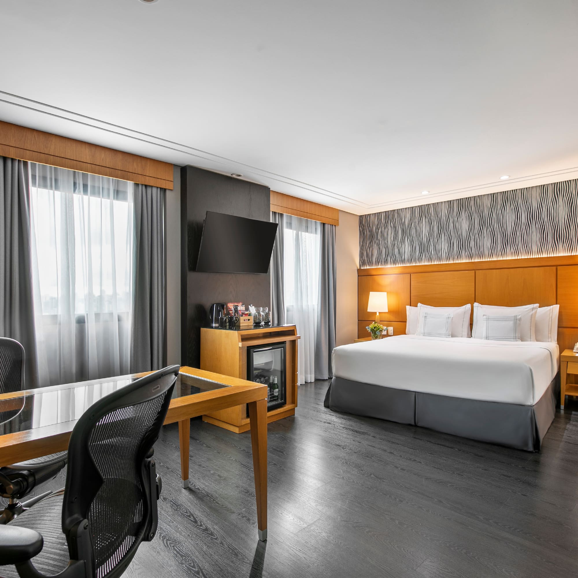 a room with a bed and a desk