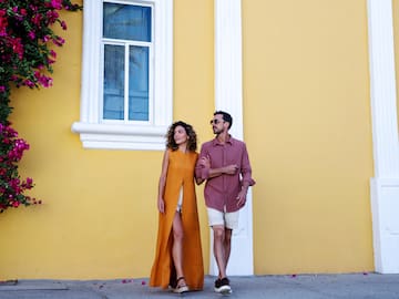 a man and woman standing next to each other