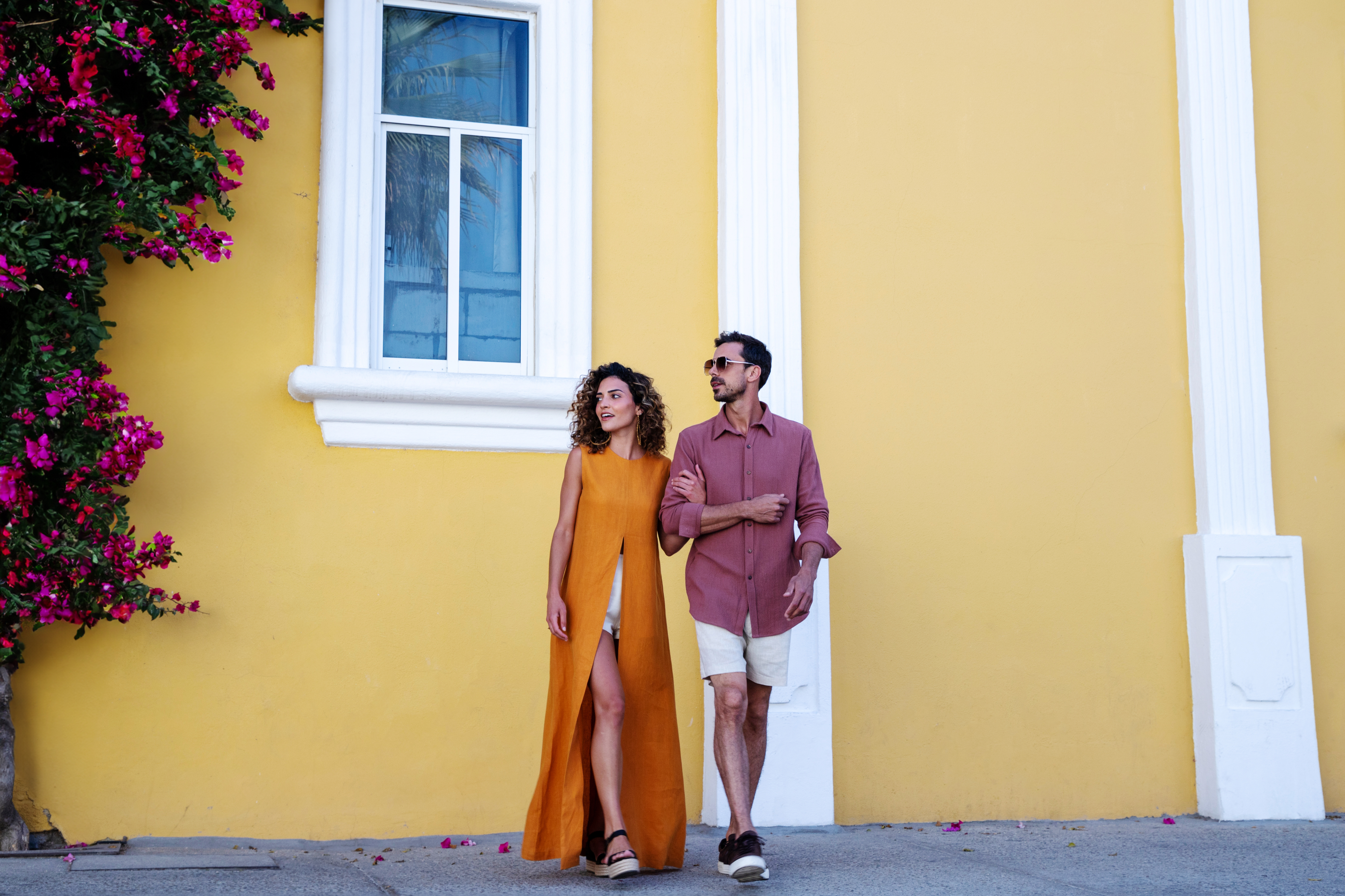 a man and woman standing next to each other