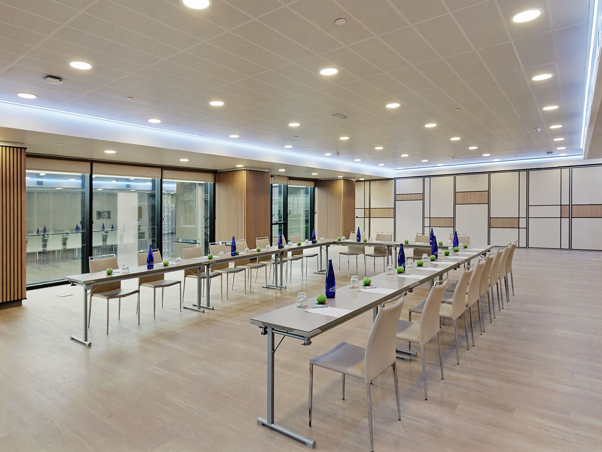 a room with tables and chairs