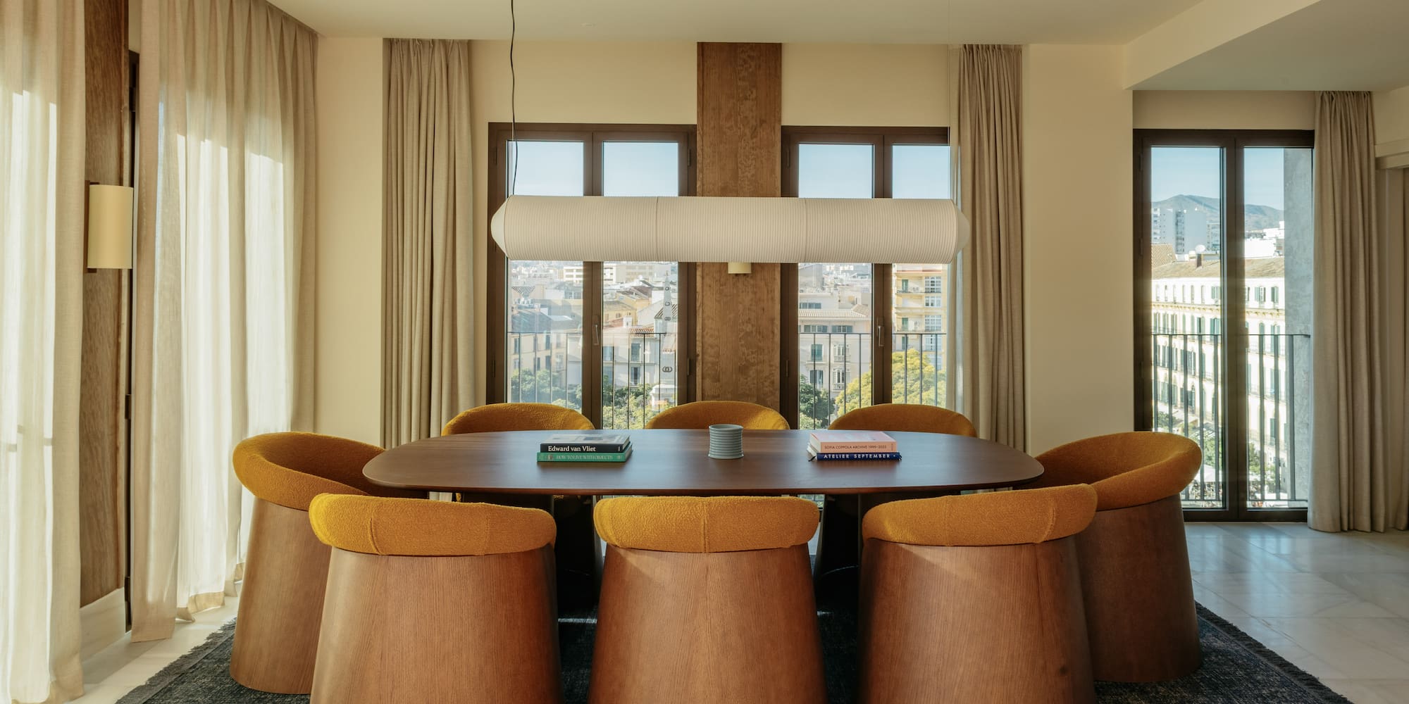 a room with a table and chairs