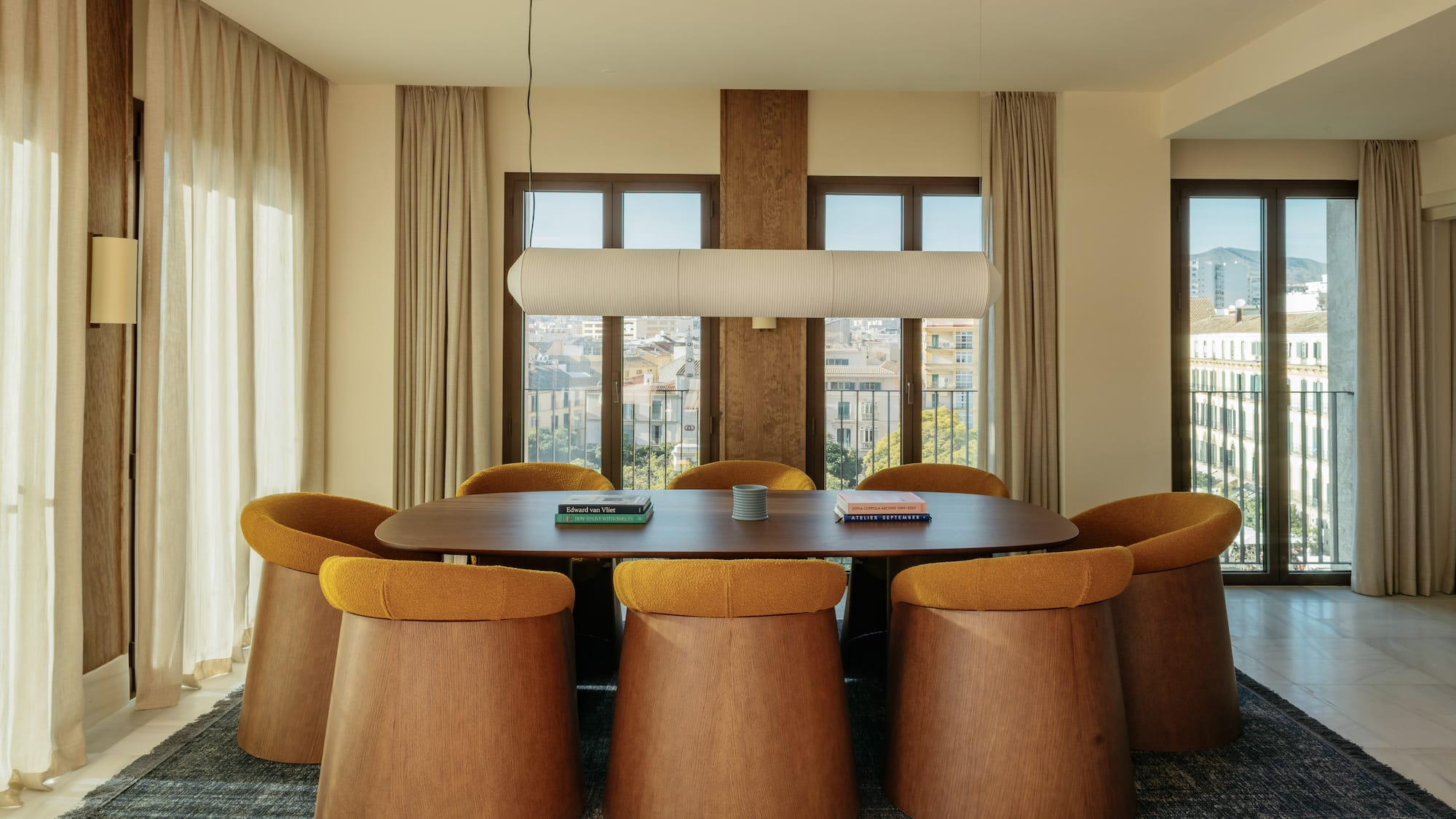 a room with a table and chairs